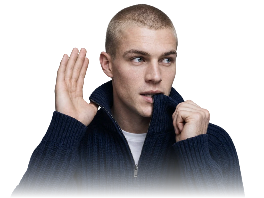 Person in a knit sweater looking aside — saying goodbye to banking fees